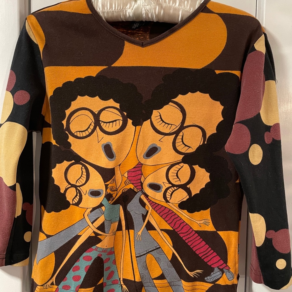 RARE Custo Barcelona design in warm tones. Sing your heart out with this one!